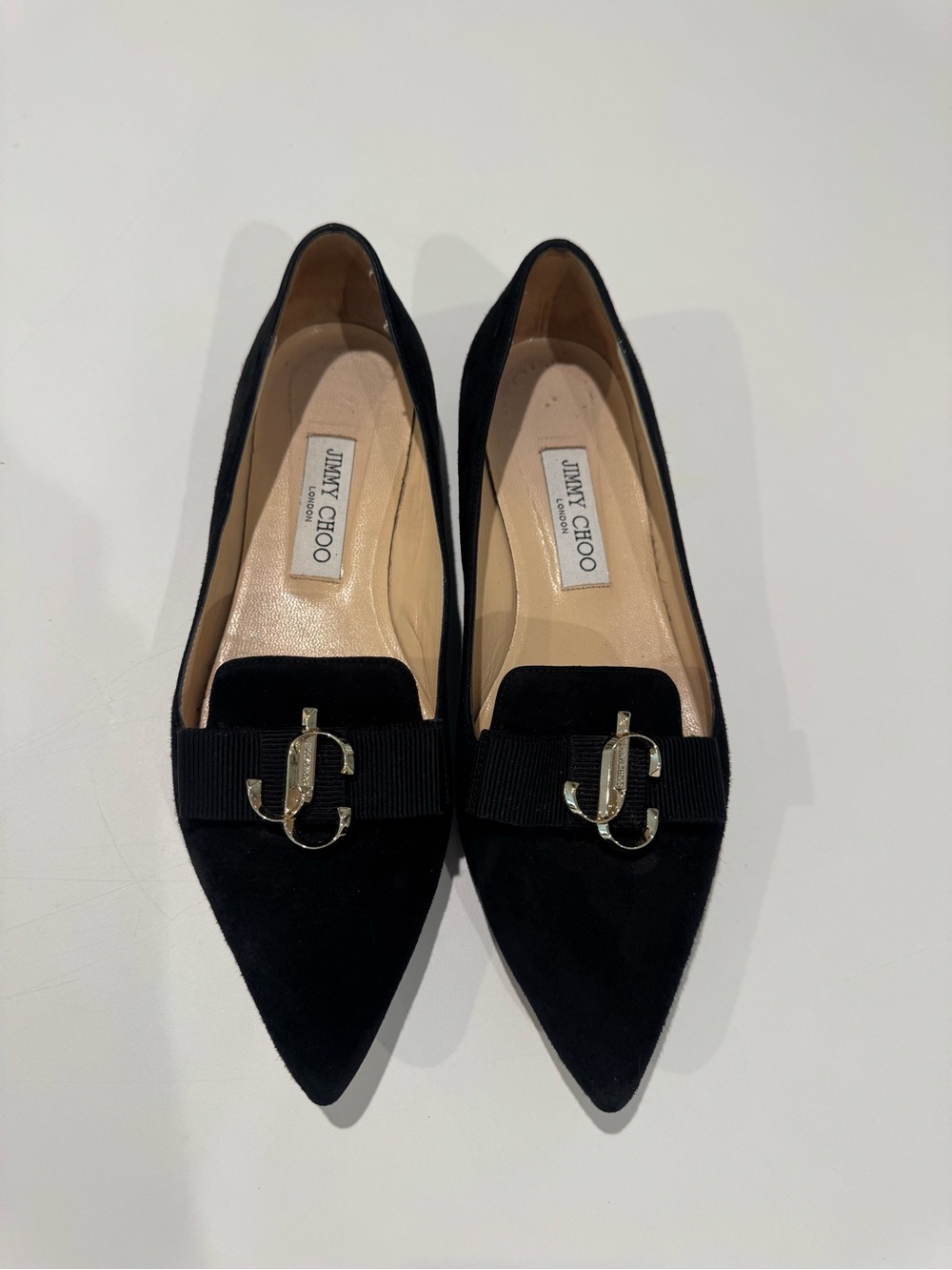 Jimmy Choo Black Suede Pointed-Toe Flats with Gold JC Emblem and Bow